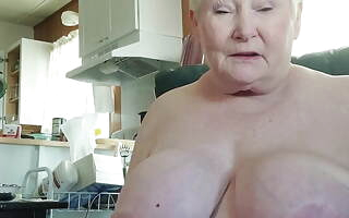 This Naughty Granny Just Loves To Talk Exploitatory And Play With Her Fat Pussy